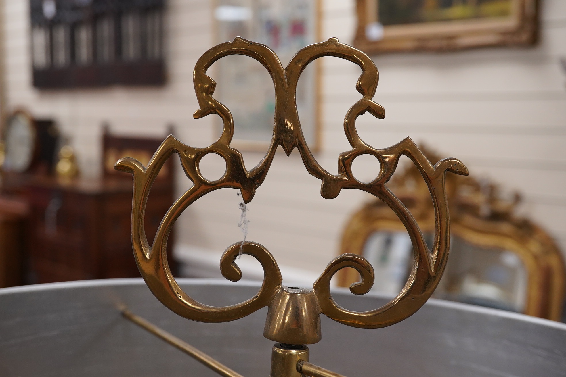 A 19th century style brass two light table lamp with metal shade, 83cm high. Condition - fair